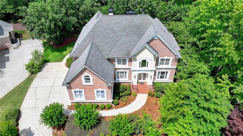 Aerial view of the home and surrounding property