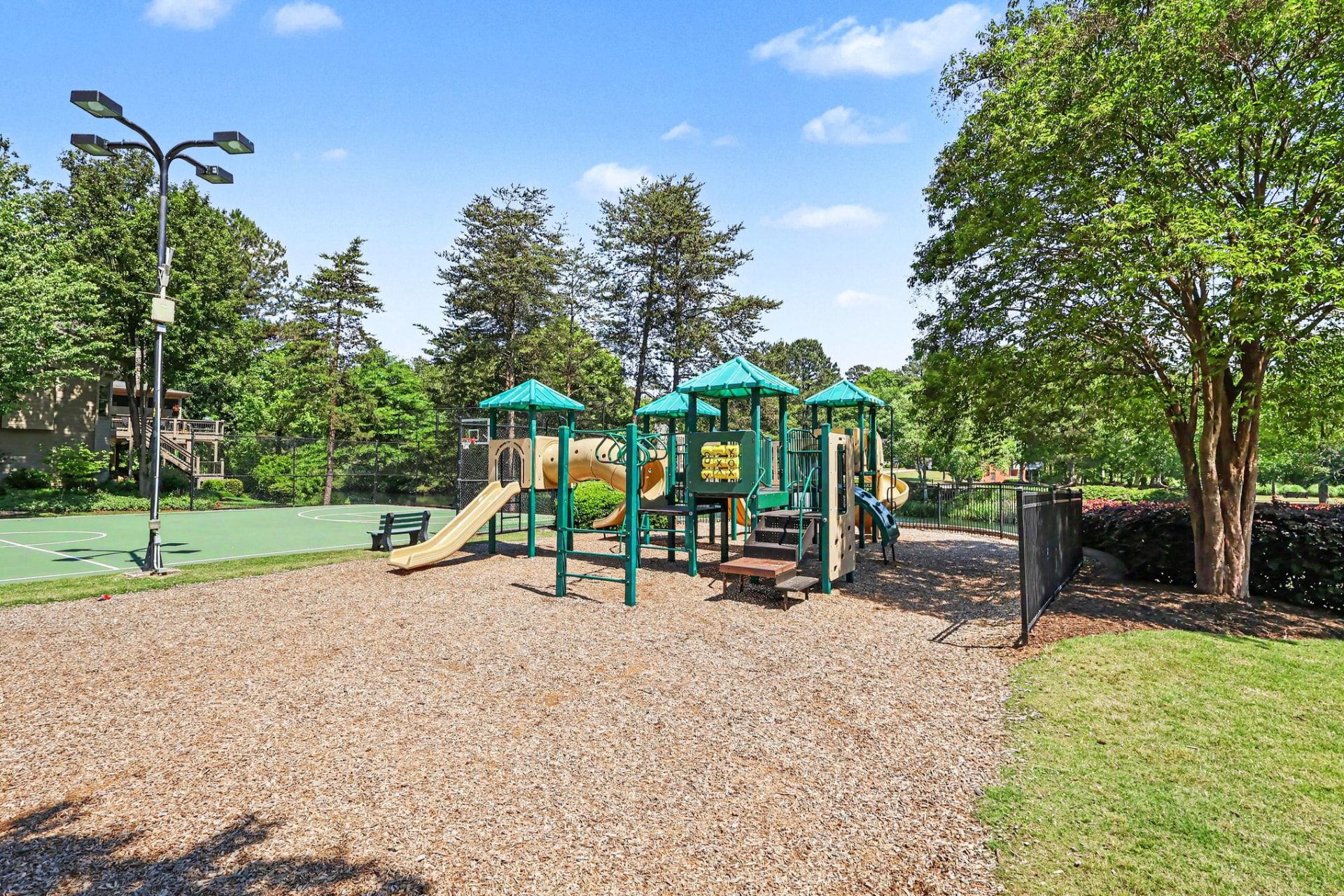 Community playground beside the sport court at Olde Atlanta Club