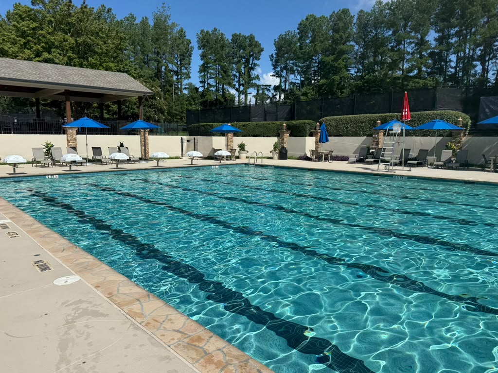 Main swimming pool with shaded seating at the St. Marlo Cabana