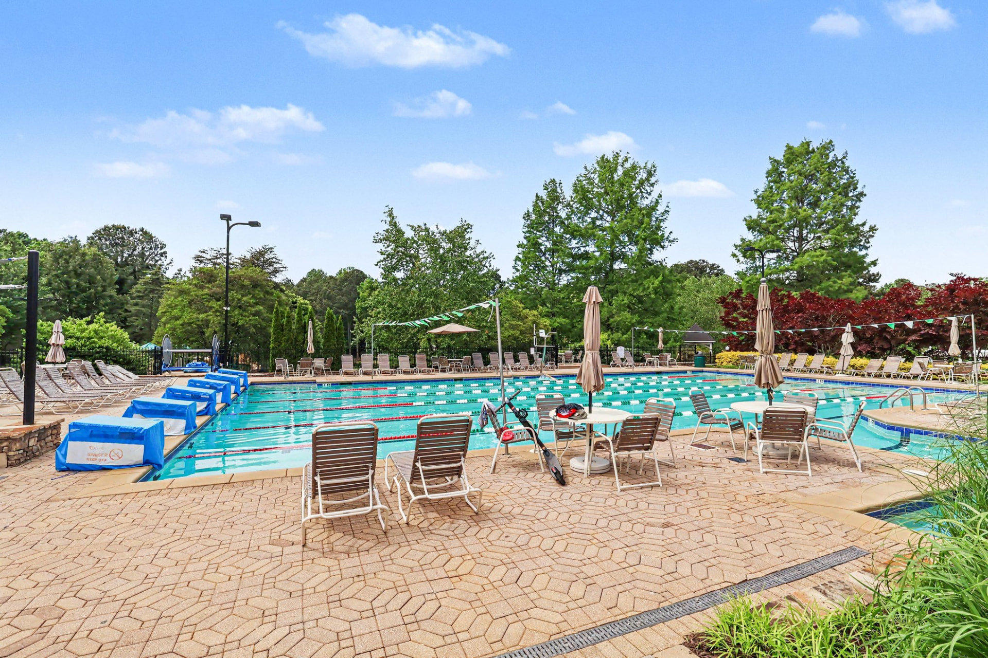 Competition swim complex with lap lanes and lounge seating at Olde Atlanta Club